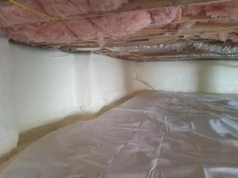 Crawl space encapsulation with closed-cell spray foam for Commercial Roof Restoration in Wichita